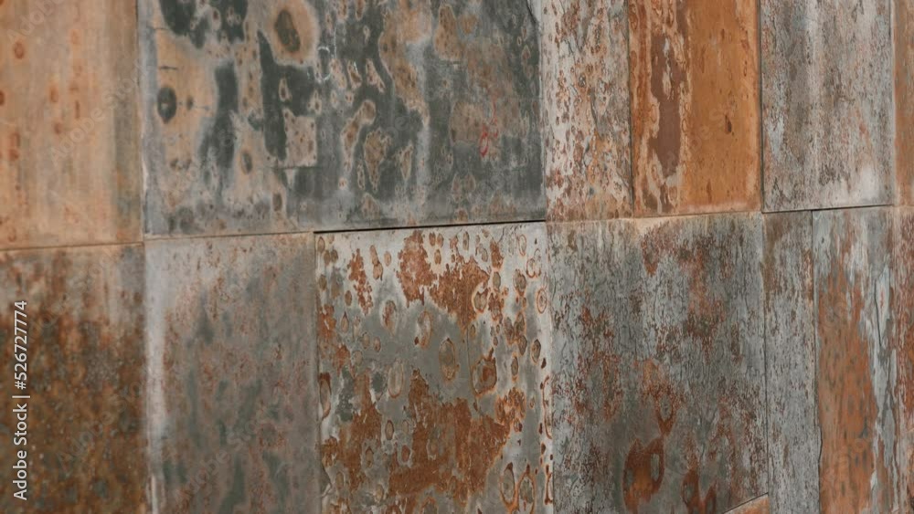 Texture wall exterior tile with rusty weathered brown grunge surface