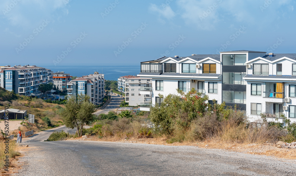 Cityscape of a residential area with modern apartment buildings.