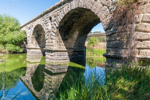 Landscape over the history Roman bridge of Vila Formosa in the district of Portalegre, Portugal photo
