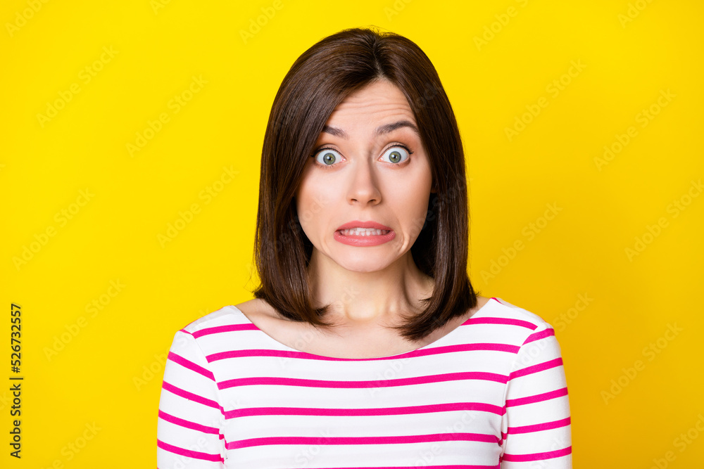 Closeup photo of young adorable cute girl looking you oops failed forget turn off water isolated on yellow color background Closeup photo of young adorable cute girl looking you oops failed forget turn off water isolated on yellow color background