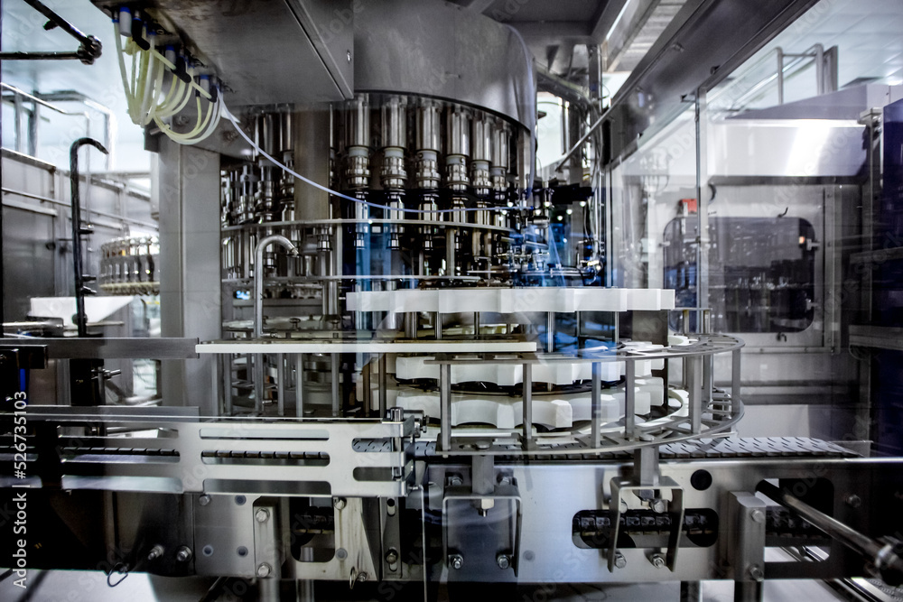 Equipment on beverage factory. Industrial drink production Equipment on beverage factory. Industrial drink production