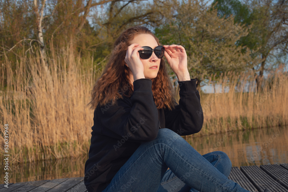 European-looking girl with blond hair and glasses European-looking girl with blond hair and glasses