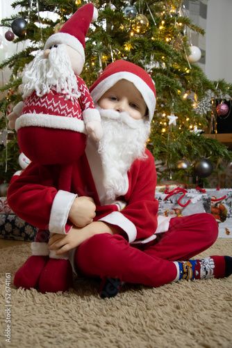 European boy in a Santa suit, Christmas, New Year