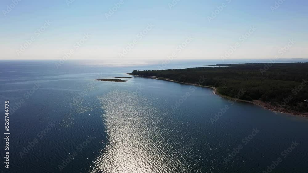 Aerial view of the coastline of west Aland, sunny, summer day in Finland - tracking, drone shot Aerial view of the coastline of west Aland, sunny, summer day in Finland - tracking, drone shot