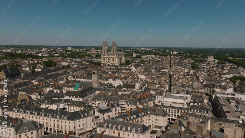 Aerial view of Paris suburb French city of Orleans. Roofs of medieval houses of the historical city. City center with beautiful houses and a church.