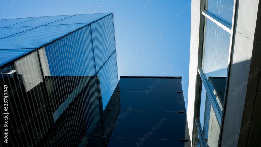 Fototapeta premium Modern buildings on the blue sky background 
