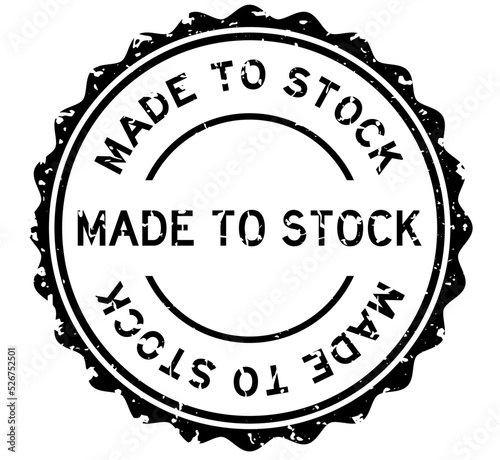 Grunge black made to stock word round rubber seal stamp on white background