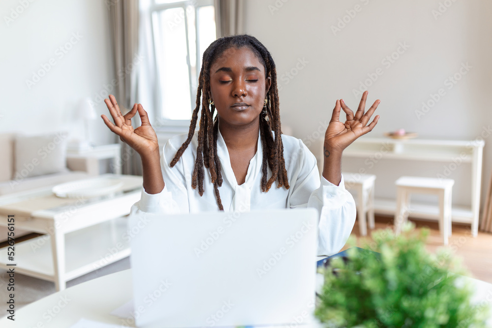 Cheerful african american lady designer having video conference with clients, sitting at desk in front of computer, holding color palettes, gesturing and smiling, copy space Cheerful african american lady designer having video conference with clients, sitting at desk in front of computer, holding color palettes, gesturing and smiling, copy space