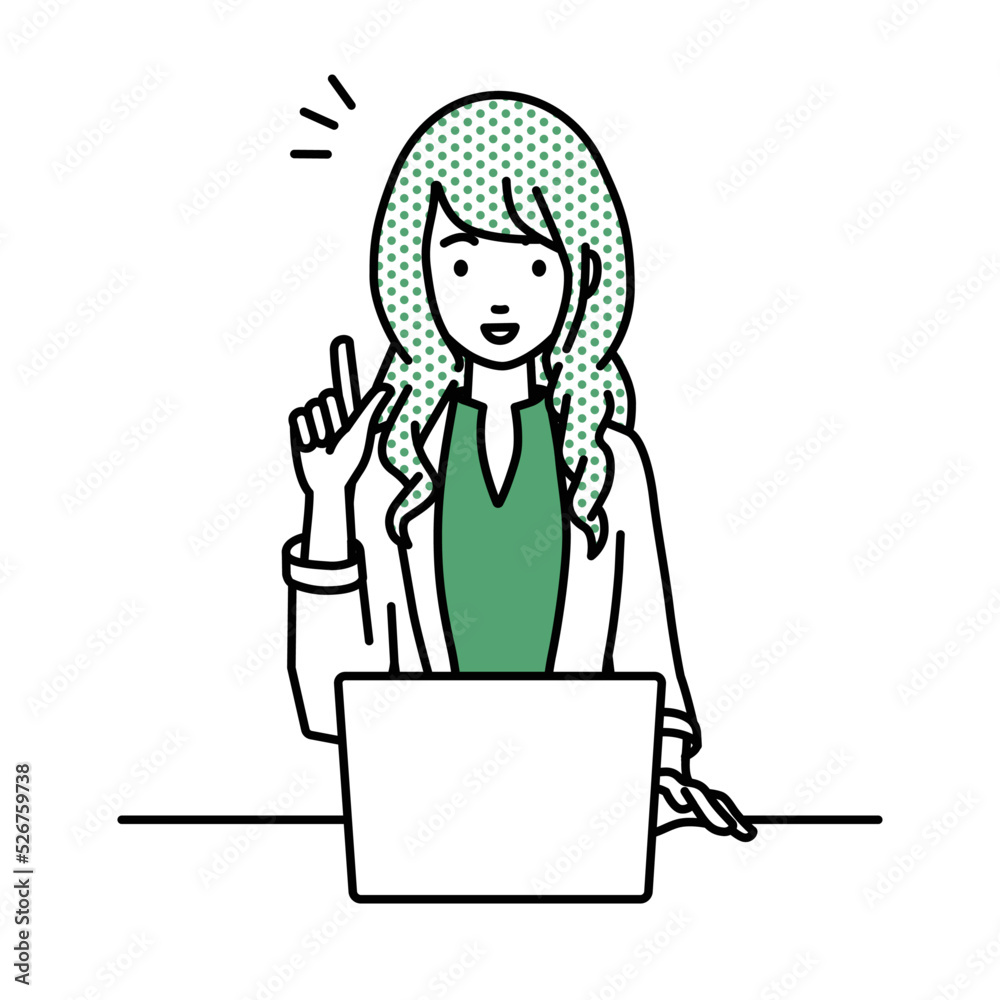 デスクで座ってPCを開いて何かひらめいたジャケットの女性