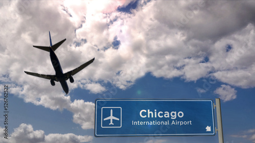 Plane landing in Chicago Illinois, USA airport with signboard