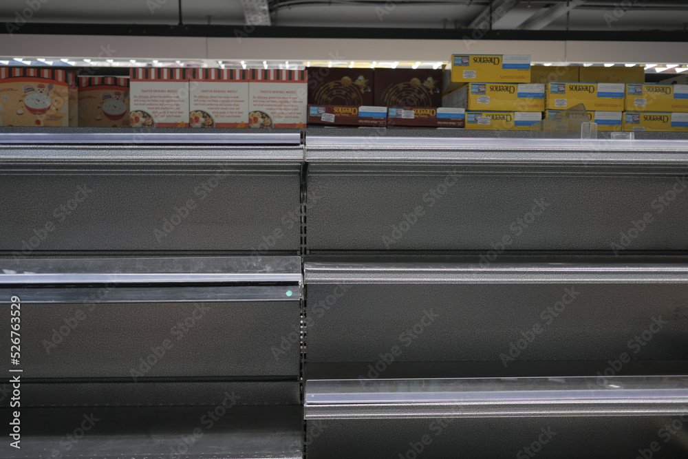 Obraz premium Empty supermarket shelves, selective focus 