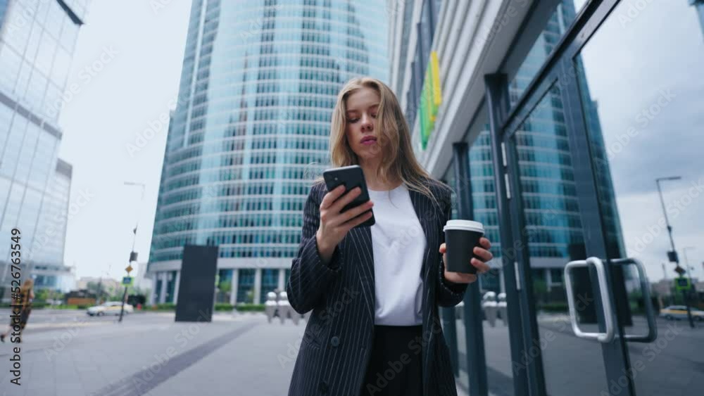 portrait of confident and ambitious business lady in center of big city, woman is walking portrait of confident and ambitious business lady in center of big city, woman is walking