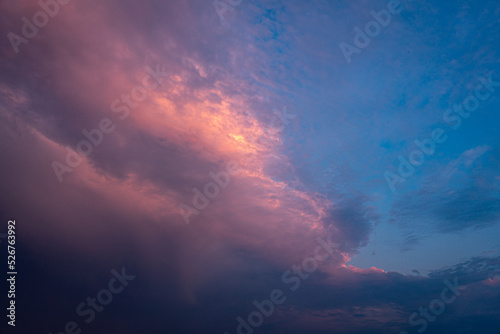 Oncoming storm clouds during the sunset