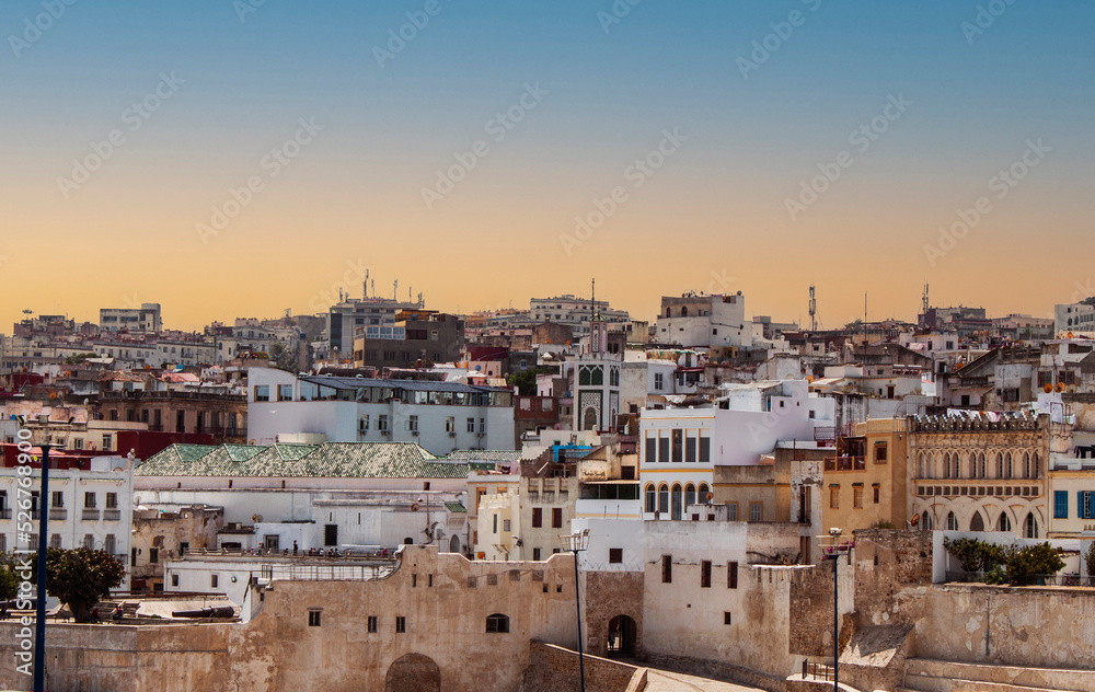 Historical townhouses of the old Medina (Jewish downtown district) in Tangier, Morocco, Africa. Cityscape with traditional Arabic buildings in the ancient old town of the Moroccan city.