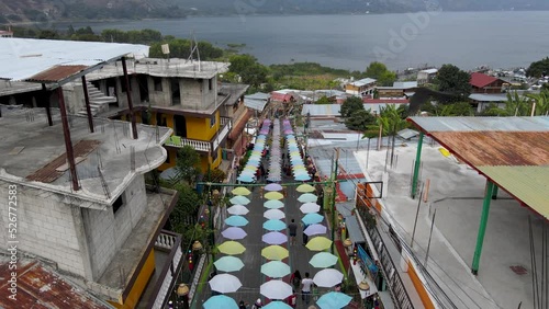 Beautiful aerial cinematic footage of the Panajachel town next to the Atitlan lake in Guatemala. photo