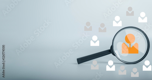 Human Resource Management(HRM) concept. Magnifying glass searching focus to professional manager icon recruitment employee work for development business leadership and customer target group.