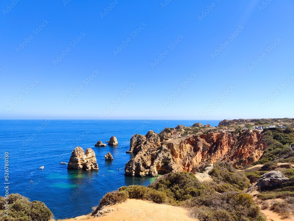 Praia Dona Ana beach with turquoise sea water and cliffs, Portugal. Beautiful Dona Ana Beach (Praia Dona Ana) in Lagos, Algarve, Portugal.
Praia Dona Ana beach with turquoise sea water and cliffs, Portugal. Beautiful Dona Ana Beach (Praia Dona Ana) in Lagos, Algarve, Portugal.