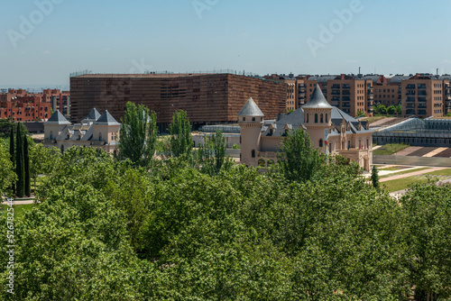 View of a park, some castles and modern residential buildings in the city of Alcorcón, Madrid