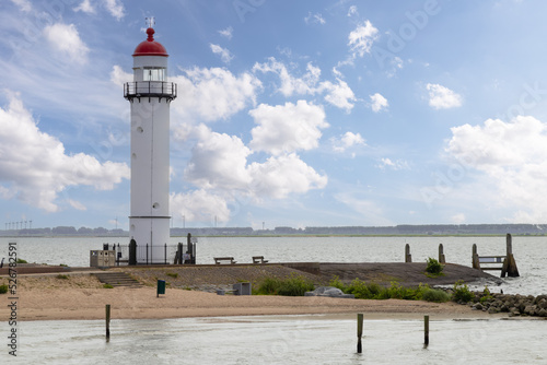 Lighthouse of the dutch village Hellevoetsluis in the provice south holland.  photo