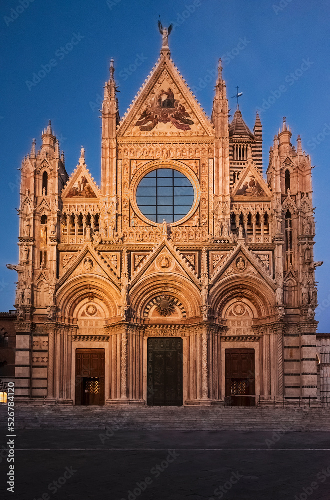 the facade of the Cathedral of Siena photographed a few minutes after sunset