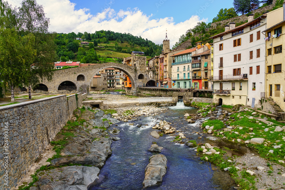 River Ter as it passes through the medieval village of Camprodon with its ancient stone bridge. Gerona.