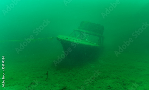 Canvas Print Gloomy underwater wreck of recreational speed boat