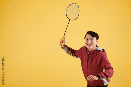 Man Enjoying Playing Badminton © DragonImages