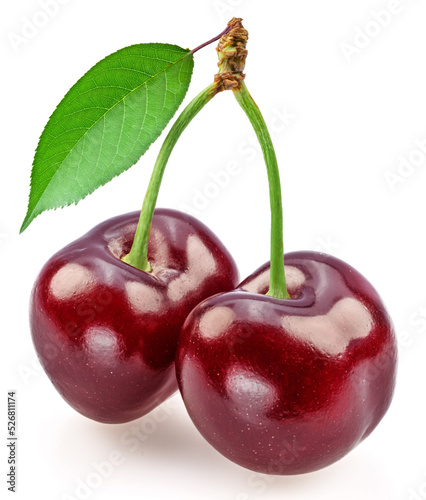 Sweet cherries with leaf isolated on white background.