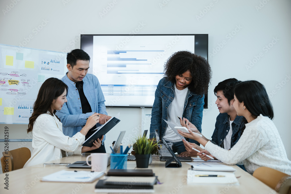 Group of professional business people are working and brainstorming discussed about work in conference room within office space. Group of professional business people are working and brainstorming discussed about work in conference room within office space.