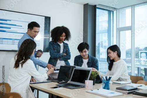 Group of professional business people are working and brainstorming discussed about work in conference room within office space.