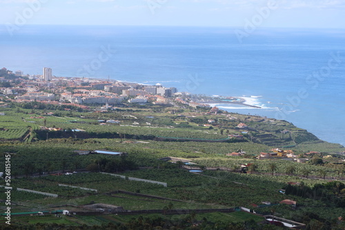 La Orotava, Tenerife, Spain, February 23, 2022: Views of the La Orotava valley from the Humboldt viewpoint with Puerto de la Cruz and the Atlantic Ocean in the background. La Orotava, Tenerife. Spain photo