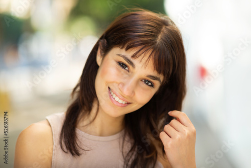 Beautiful young woman with brown hair