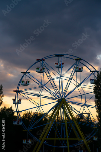 Nursultan, Kazakhstan, August 2022. Ferris wheel against the sunset sky. High quality photo