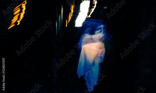 blurred image of ghost in the attic haunted house for Halloween