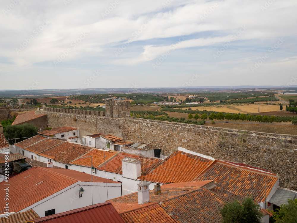 View of the Alentejo plain over the roofs of Serpa seen from the castle wall View of the Alentejo plain over the roofs of Serpa seen from the castle wall