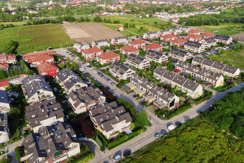 Aerial view of suburban neighborhood, Residential district with houses and streets in small european town