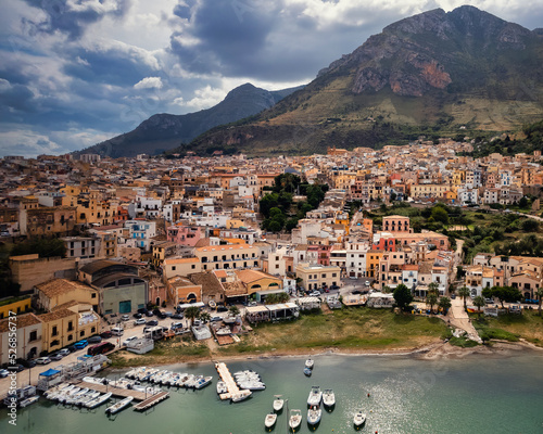 Tablou canvas Aerial shot of Castellammare del Golfo, Italy, where a lake, buildings, and a mo
