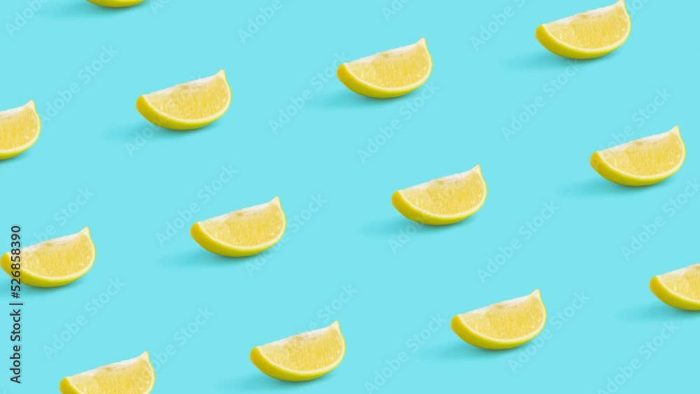 Creative minimal summer fruit concept made of lemon slices on pastel blue background 4k.