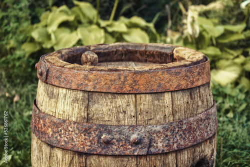 Wooden beer barriel with rusty rings outdoor