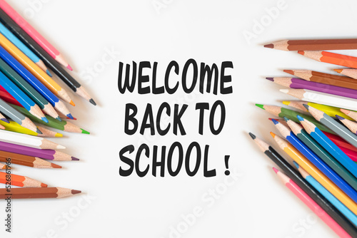 Welcome back to school text.
back to school idea concept.
colorful pencils.
