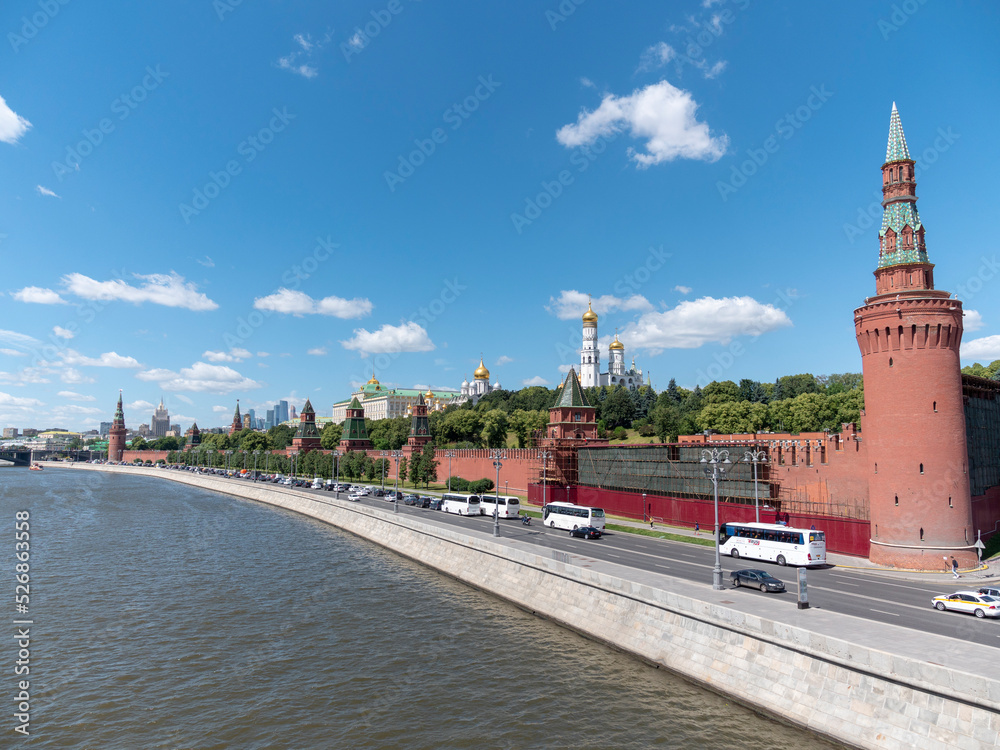 The Grand Kremlin Palace and Kremlin wall in sunny autumn day The Grand Kremlin Palace and Kremlin wall in sunny autumn day
