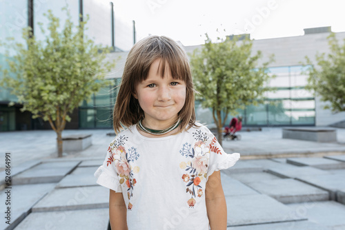 Wallpaper Mural Portrait of a little girl outside in summer at glass building Torontodigital.ca