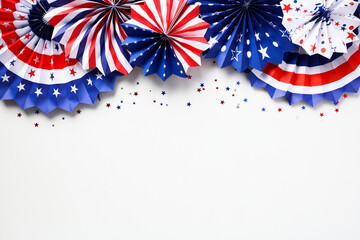 Labor day concept. Flat lay composition with USA flag color decorations paper fans and confetti on white background. Happy Labor day, 4th of July, Columbus day banner design.