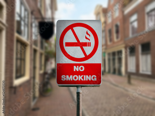 Sign No Smoking and beautiful view of city street