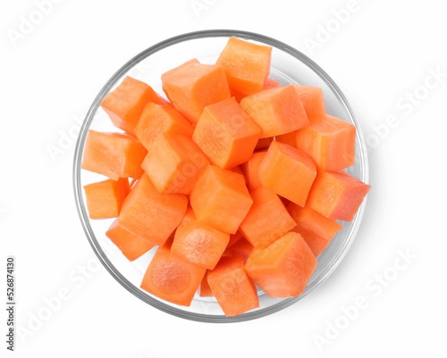 Delicious diced carrots in glass bowl isolated on white, top view