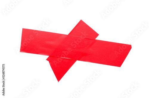 Cross of red insulating tape isolated on white, top view