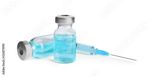 Vials and syringe on white background. Vaccination and immunization