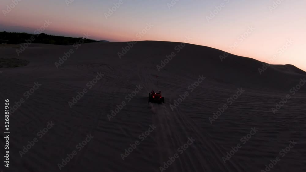 UTV vehicles off-roading in the sand dunes UTV vehicles off-roading in the sand dunes