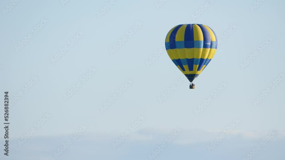 Pommard, Burgundy, France - August 8, 2021: Hot air balloon ride above the Burgundy landscape. Cote de Beaune, Pommard region. Pommard, Burgundy, France - August 8, 2021: Hot air balloon ride above the Burgundy landscape. Cote de Beaune, Pommard region.