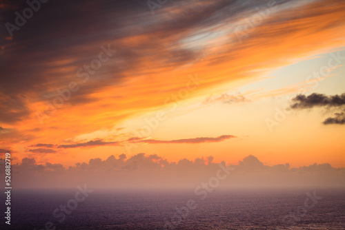 Sunset or sunrise over sea surface